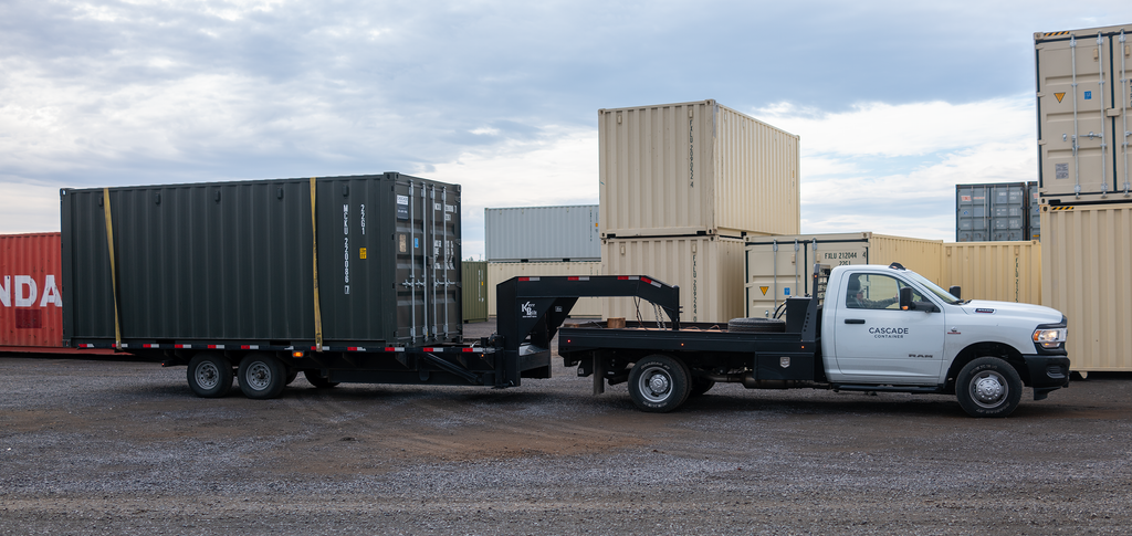 Cascade Vaults Truck with 20' tilt bed trailer and 20' container