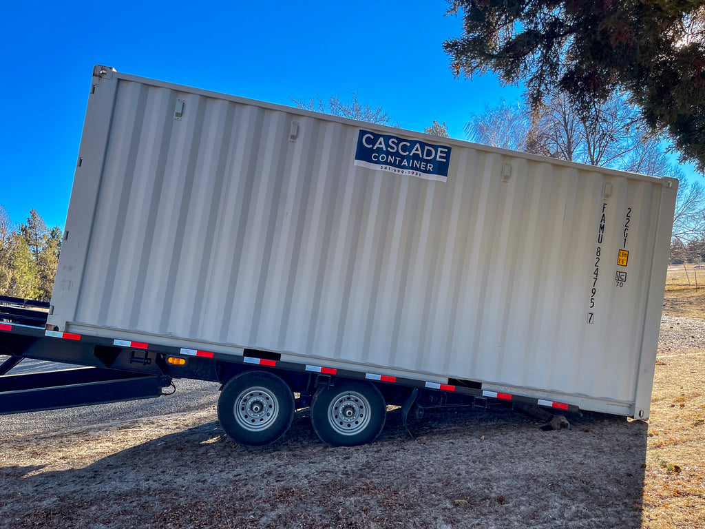 Cascade Vaults 20' container on tilt bed trailer